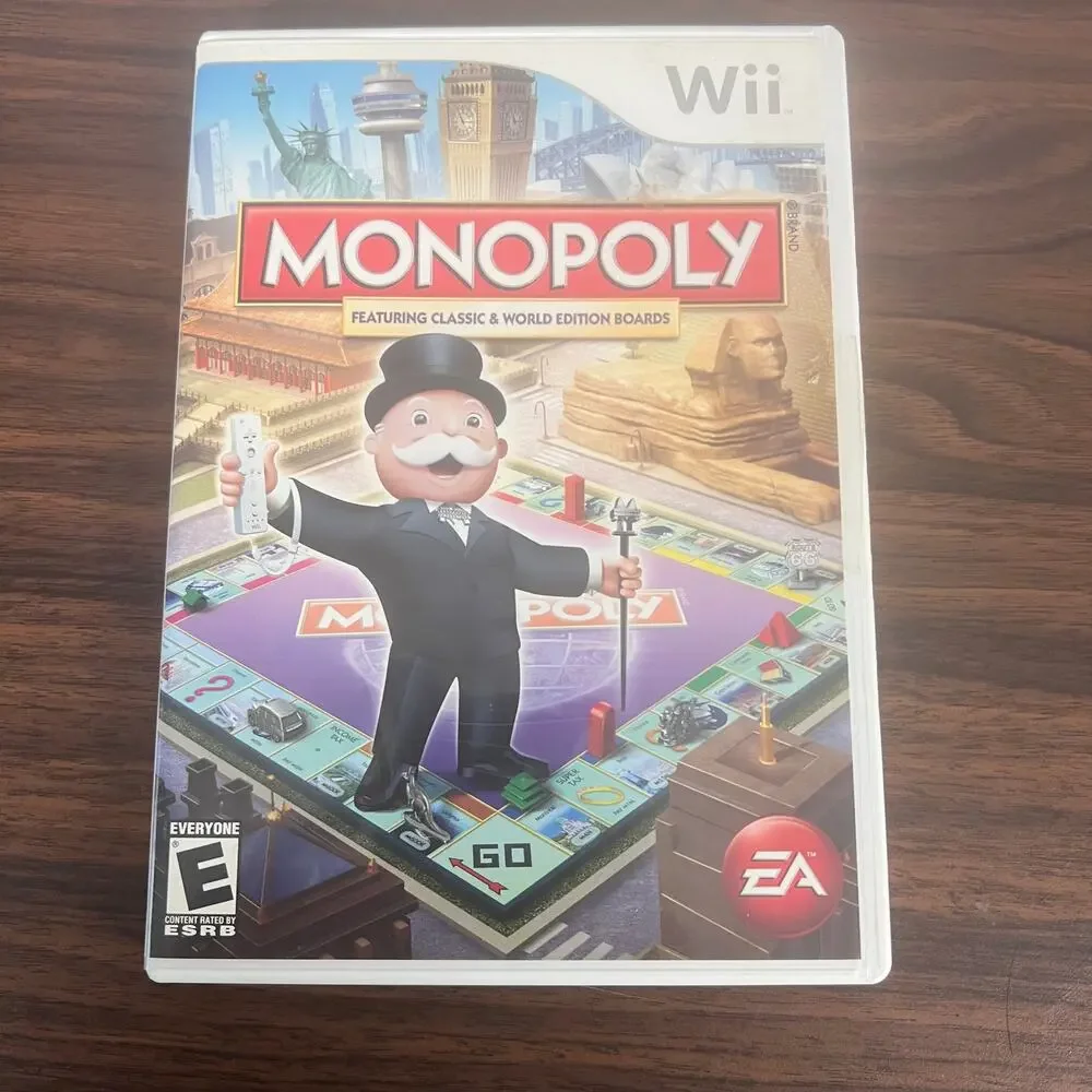 Wii Lot of 4 Video Games Monopoly Backyard Football Pictionary Toy Story CIB